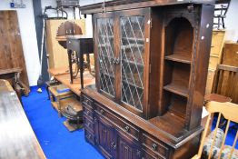 A Jaycee or similar dresser with concealed cocktail unit behind sliding top