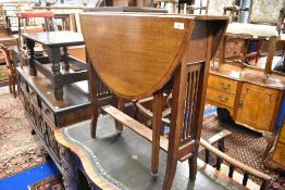 An early 20th Century mahogany Sutherland table