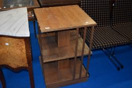 An Edwardian bleached mahogany revolving bookcase