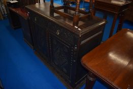 A 19th Century oak high sideboard or hall cabinet