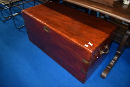 A stained frame campaign style bedding chest