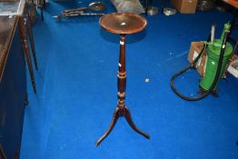 A reproduction mahogany wine table