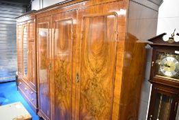 An Edwardian mahogany triple wardrobe, approx. W186 H200 D62