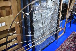 A modern vintage metal bed head board