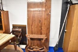 An Exotic hardwood dining table having scroll frame with cast fixings, approx. 200 x 84cm