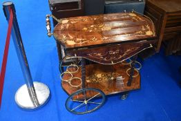 A vintage Italian style drinks trolley