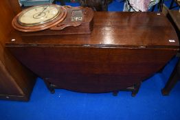 A period oak gateleg dining table having frieze drawer and turned frame