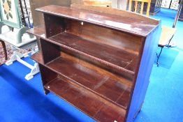 A vintage stained frame bookshelf having historical light fitting (not connected/not safe)