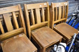 Fifteen chapel style chairs with rail backs and solid seats