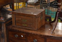 An early 20th Century oak canteen with cutlery stamped Alexander