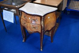 A Continental Bombe style side chest having marble top