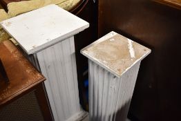 Two wooden pillars