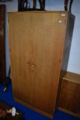 A vintage golden oak Gomme or similar wardrobe