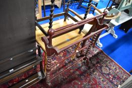 A stained frame Victorian style towel rail