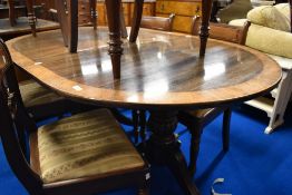An early 20th Century Regency revival D end dining table with additional leaf