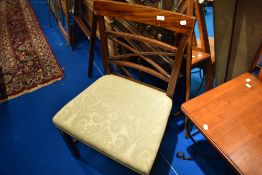 A 19th Century Regency mahogany dining chair having later upholstered seat