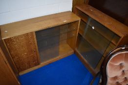 Two vintage golden oak low bookcases
