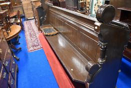 A traditional stained frame church pew etc
