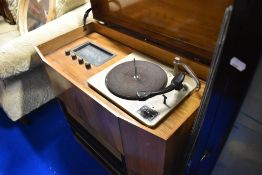 A vintage walnut cased radio gram with Collaro turntable