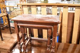 A part nest table and cork topped bathroom stool