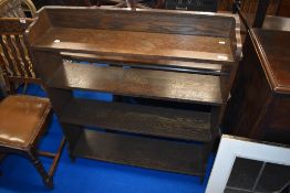 An early 20th Century oak arts and crafts style bookshelf