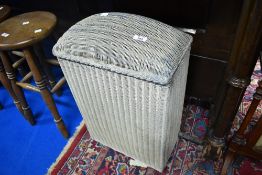 A vintage Lloyd loom dome top linen basket