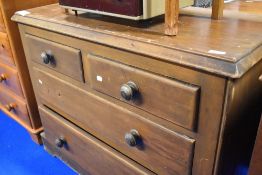 A Victorian stained pine chest of two over two drawers