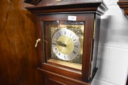 A reproduction short case clock