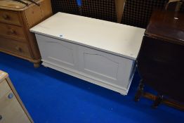 A vintage painted bedding box