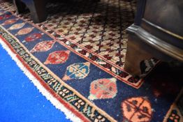 A traditional wool carpet/rug