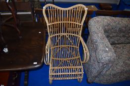 A canework rocking chair