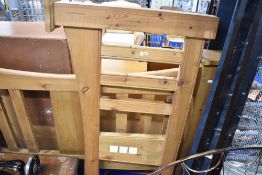 A rustic pine double bed frame