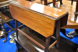 A 19th Century mahogany drop leaf occasional table on style frame with splay legs