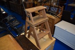 A vintage pine library or similar steps