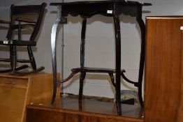 A Victorian mahogany occasional table having shaped top and undertier