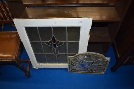 A selection of vintage leaded glass panes and frame