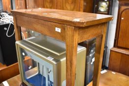 A vintage stained frame hall table