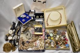 A selection of mixed vintage and antique costume jewellery, chain mail coin purses and watches.