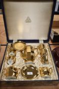 A boxed Mikado China hand painted coffee set in box, having extensive gilt finish.