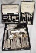 A selection of flat ware, including boxed Walker and Hall teaspoons, boxed cruet having Bristol blue
