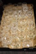 A large collection of vintage and traditional glass ware, including Victorian etched wine glasses,