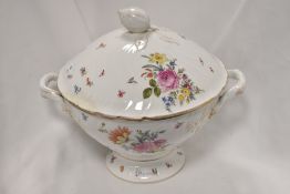 A substantial early 20th century punch bowl, having floral transfer pattern, moulded shell handle