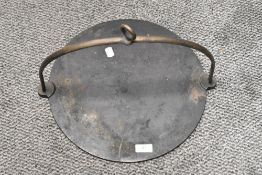 An antique open fire skillet.