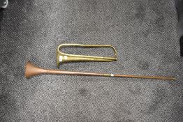 Two vintage horns, one brass the other a copper coaching horn with brass cuff, AF.