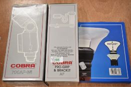 A Cobra 700AF Mi flash and a Cobra pro grip and bracket