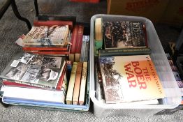 Two boxes of books, of war, maritime and weaponry interest.