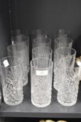 Twelve cut glass water glasses.