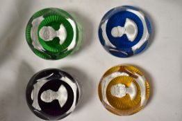Four modern Baccarat crystal and sulphide paperweights, 'The four cameos in crystal',comprising; The