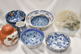 A selection of 20th century Chinese and Japanese ceramics, including hexagonal vase with bamboo