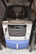 An Alba stereo/radio/cassette player.